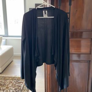 BCBG asymetrical black open sweater . M